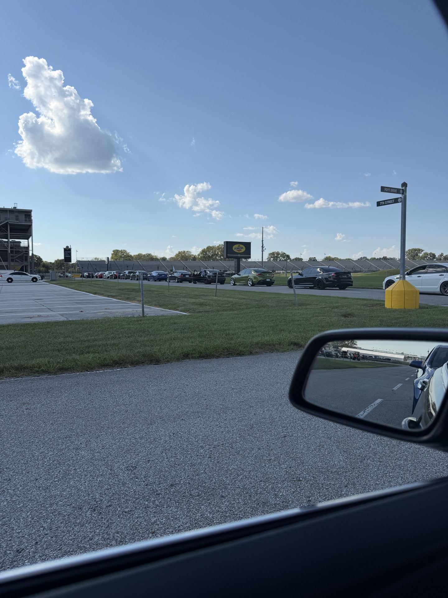 View of the road course through the SS's side mirror